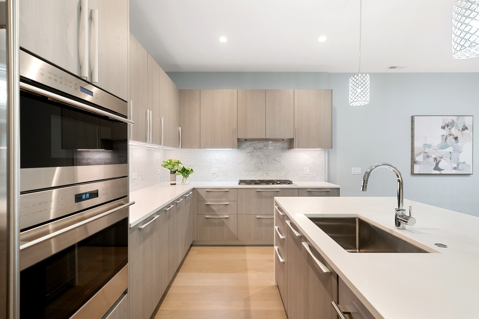 236 South Green Street, Unit 2S Chicago, IL 60607 - Photo 5 of 15 a kitchen with a sink stove and microwave