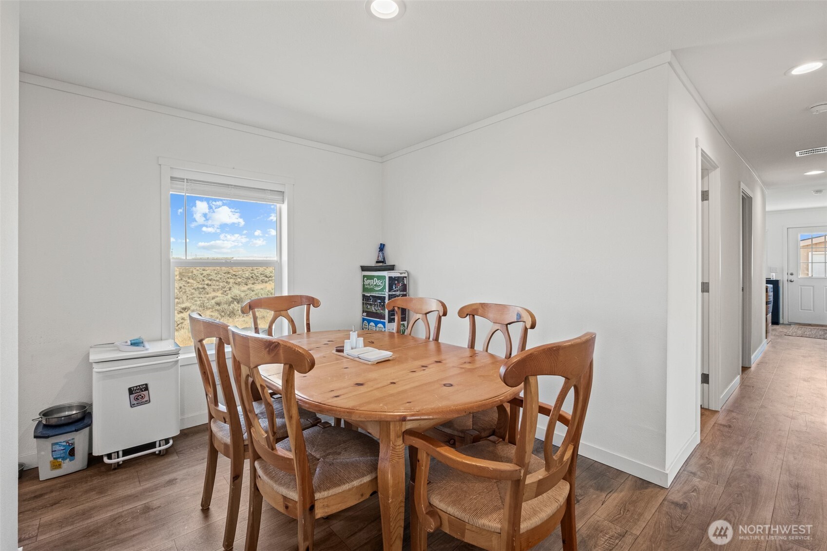910 Canyon Trail Ephrata, WA 98823 - Photo 13 of 30 a view of a dining room with furniture and wooden floor