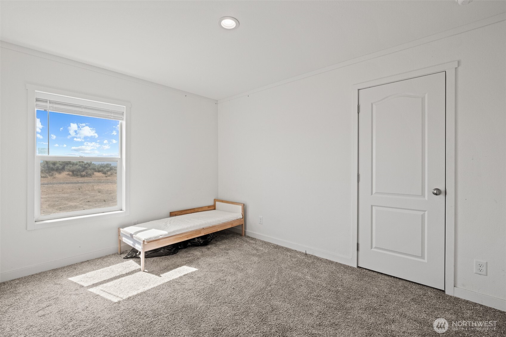 910 Canyon Trail Ephrata, WA 98823 - Photo 17 of 30 a living room with furniture and a window