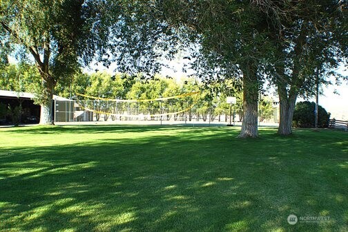 910 Canyon Trail Ephrata, WA 98823 - Photo 27 of 30 a front view of a building with a yard