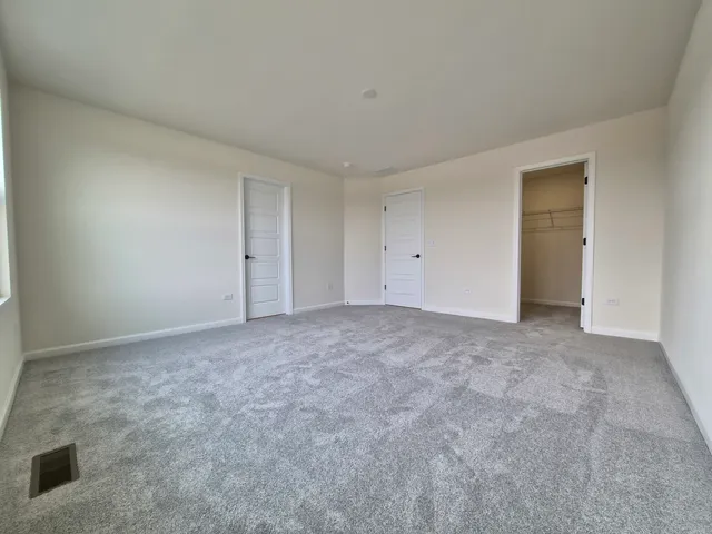 a view of an empty room and entryway