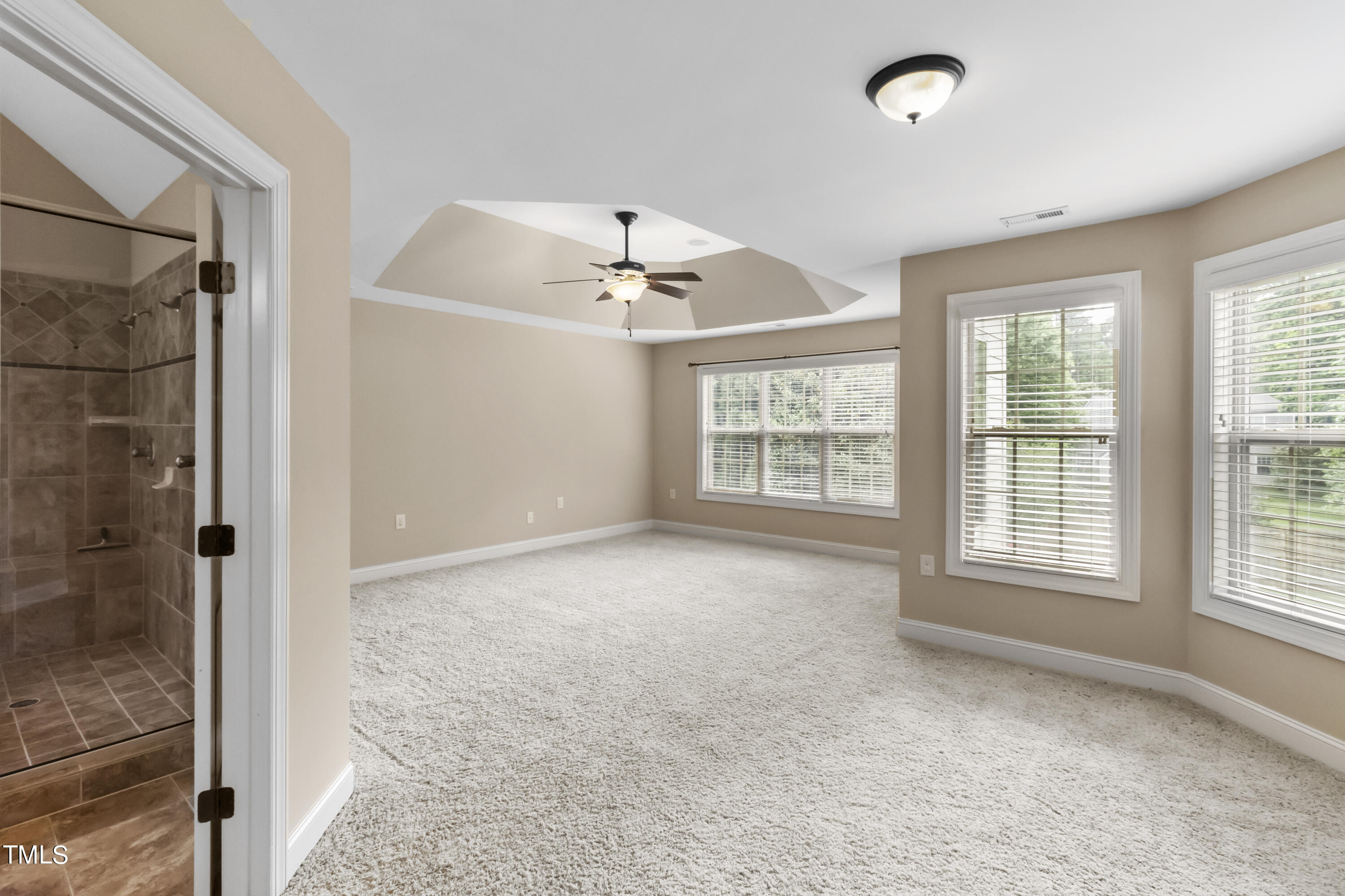 6507 Glendower Road Raleigh, NC 27613 - Photo 18 of 42 a view of an empty room with a window