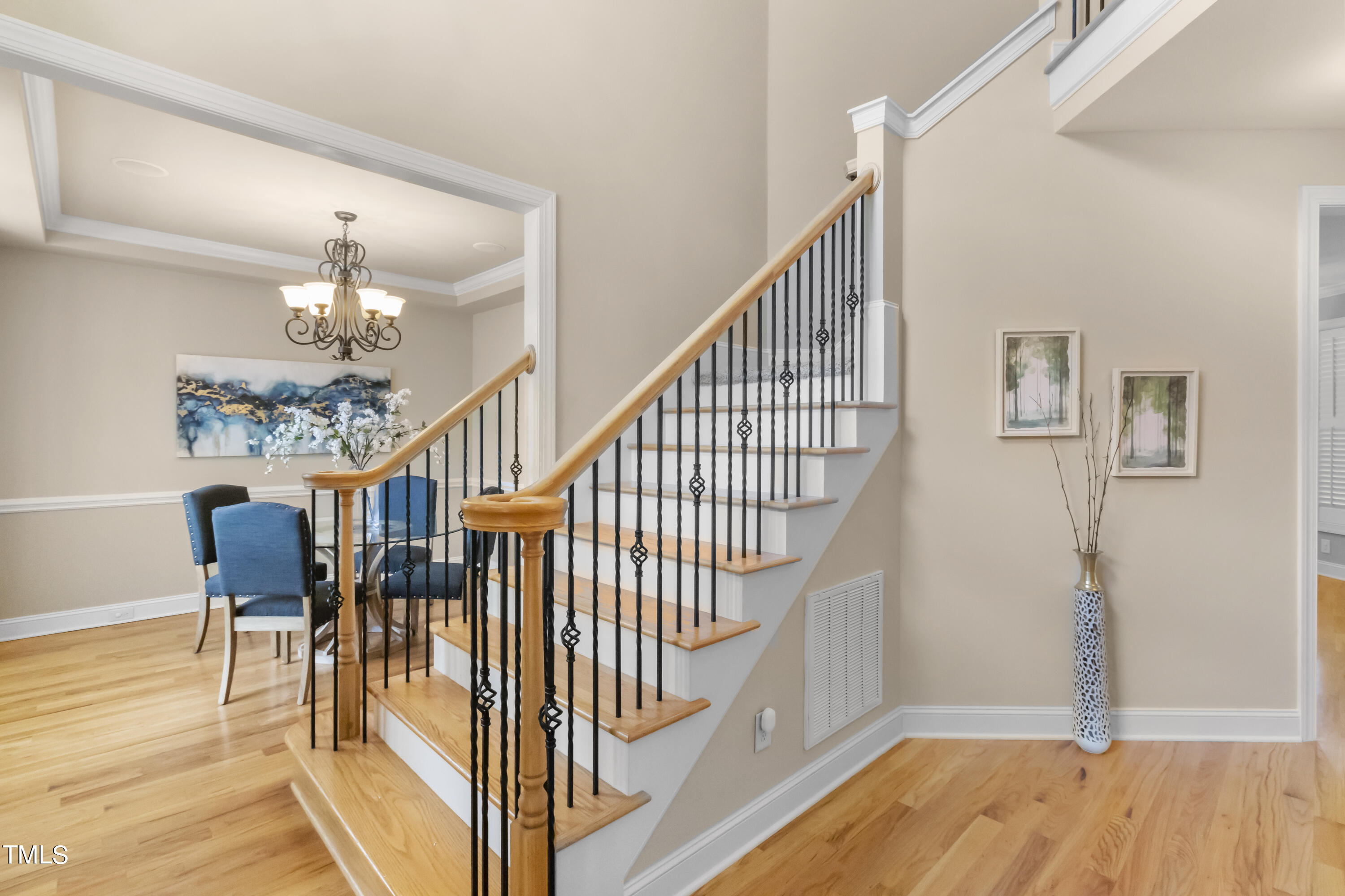6507 Glendower Road Raleigh, NC 27613 - Photo 2 of 42 a view of entryway and hall with wooden floor