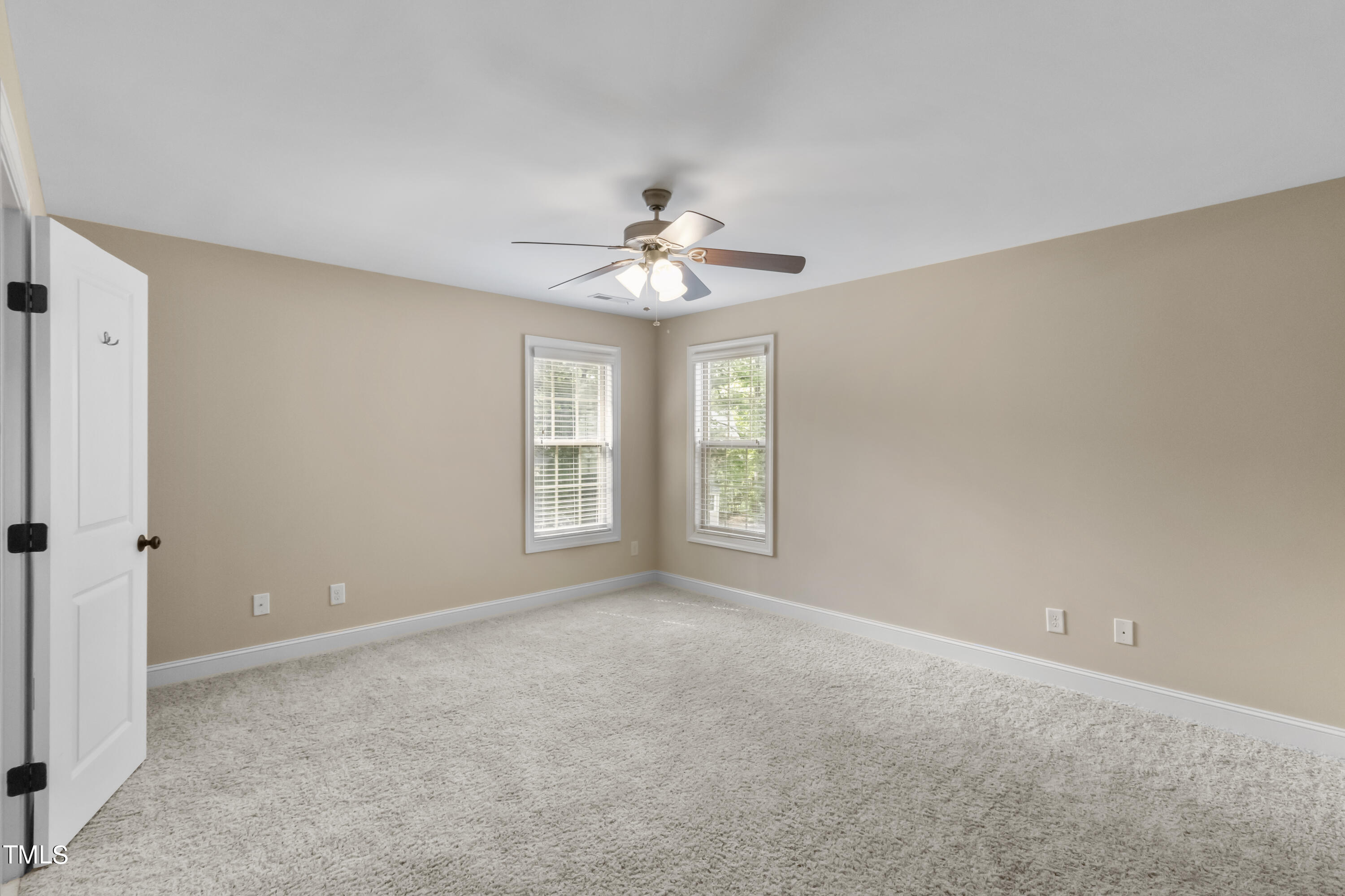 6507 Glendower Road Raleigh, NC 27613 - Photo 24 of 42 a view of an empty room with a window