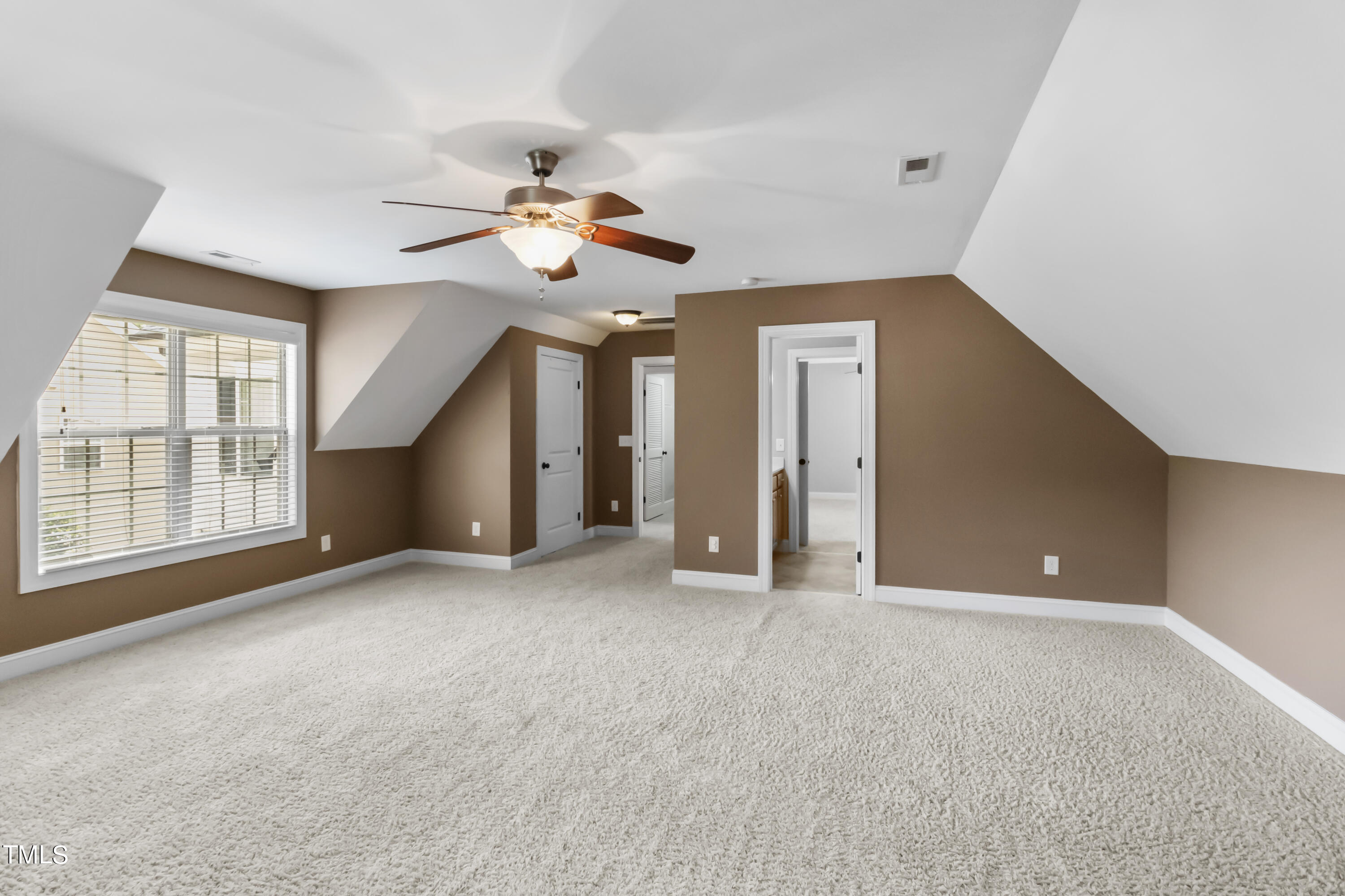 6507 Glendower Road Raleigh, NC 27613 - Photo 29 of 42 a view of an empty room with a window