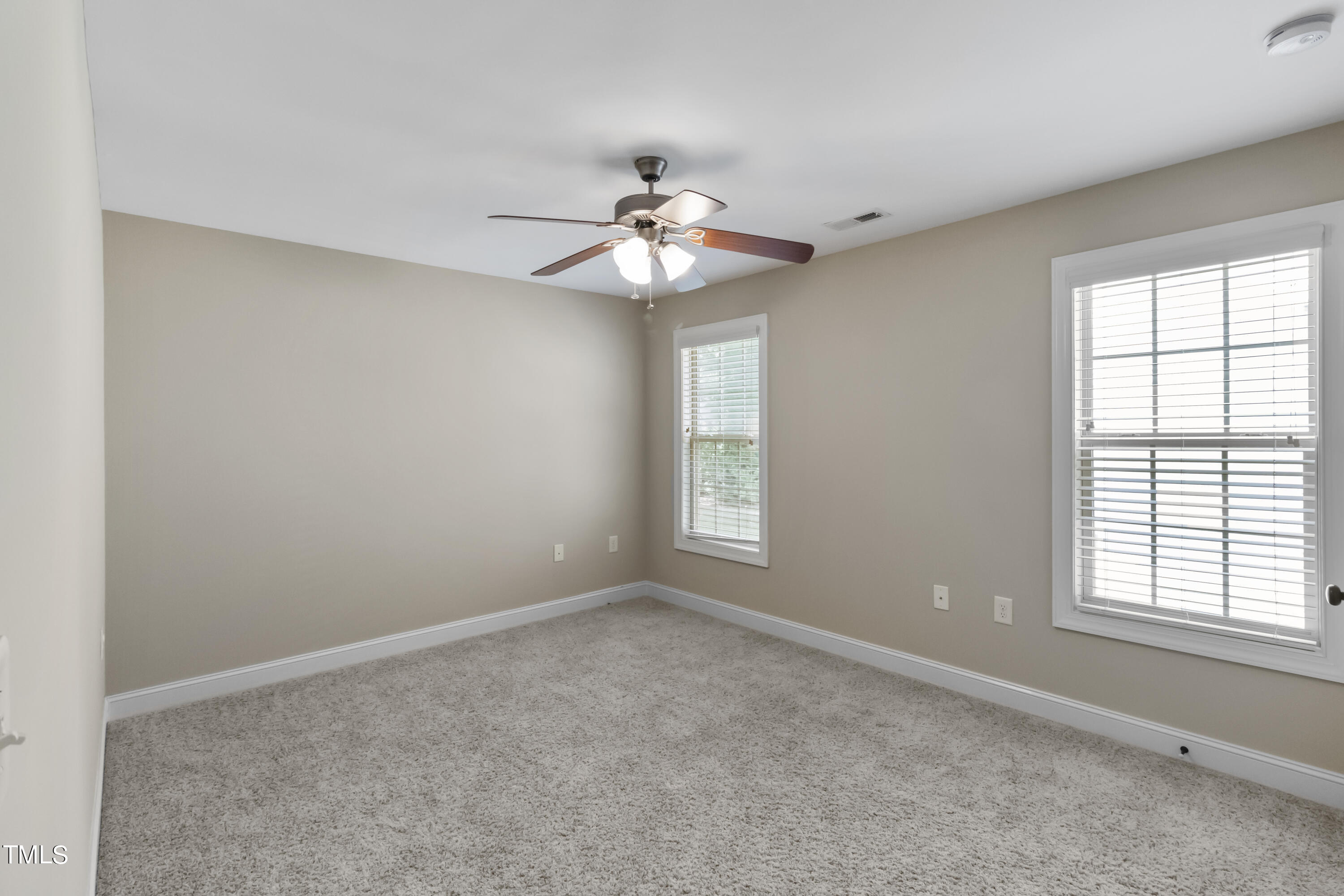 6507 Glendower Road Raleigh, NC 27613 - Photo 32 of 42 a window in an empty room