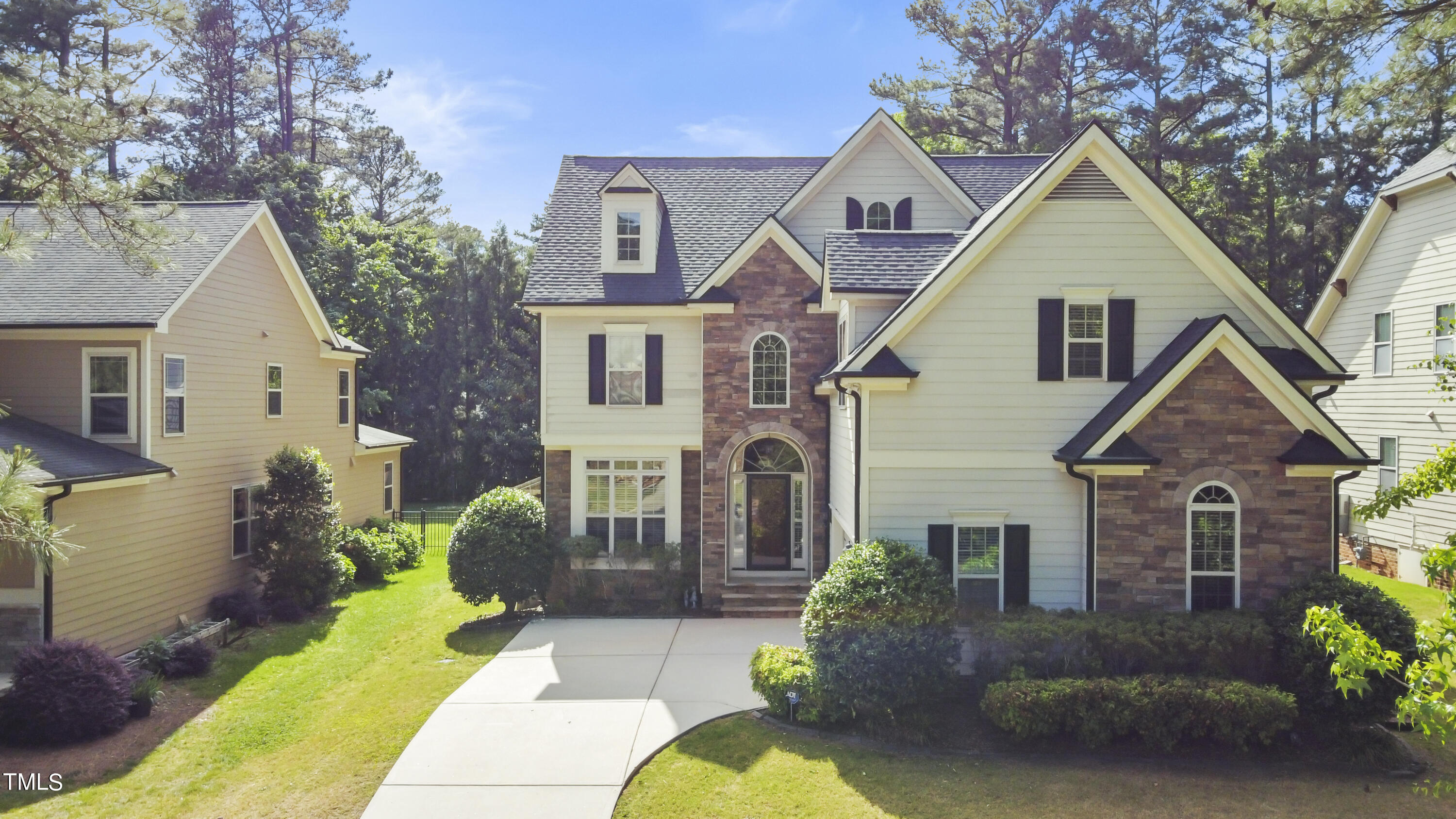6507 Glendower Road Raleigh, NC 27613 - Photo 39 of 42 a front view of a house with garden