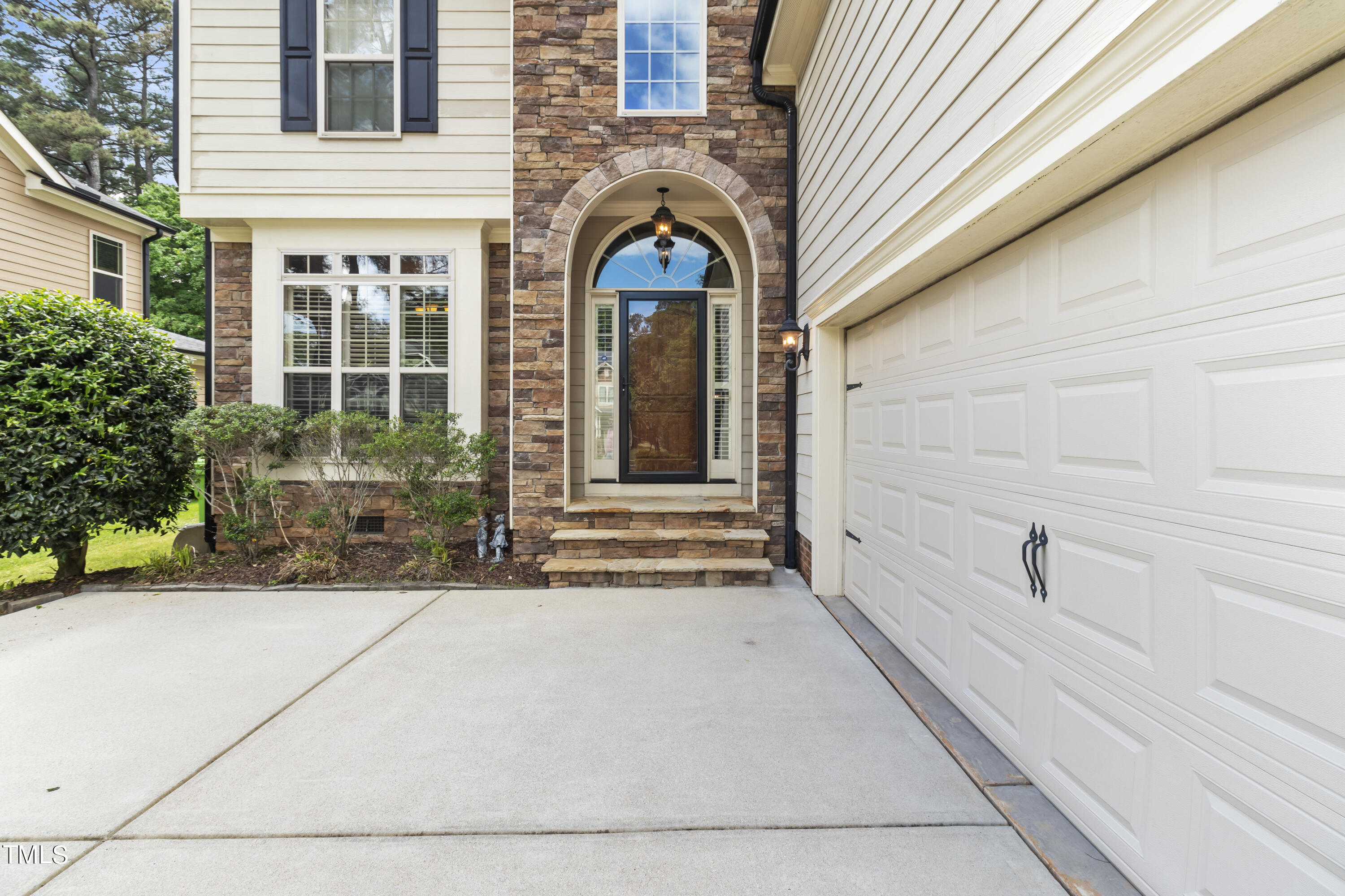 6507 Glendower Road Raleigh, NC 27613 - Photo 40 of 42 a house view with a outdoor space
