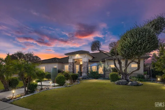 a view of a building with a yard