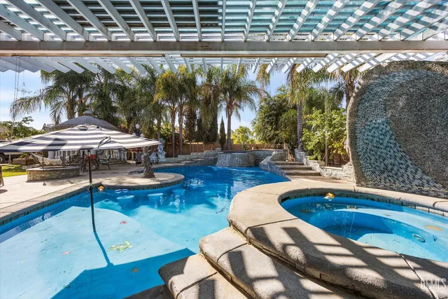 a view of a backyard with a patio