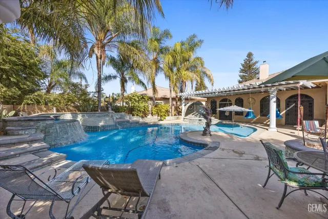 a front view of house with yard and seating area