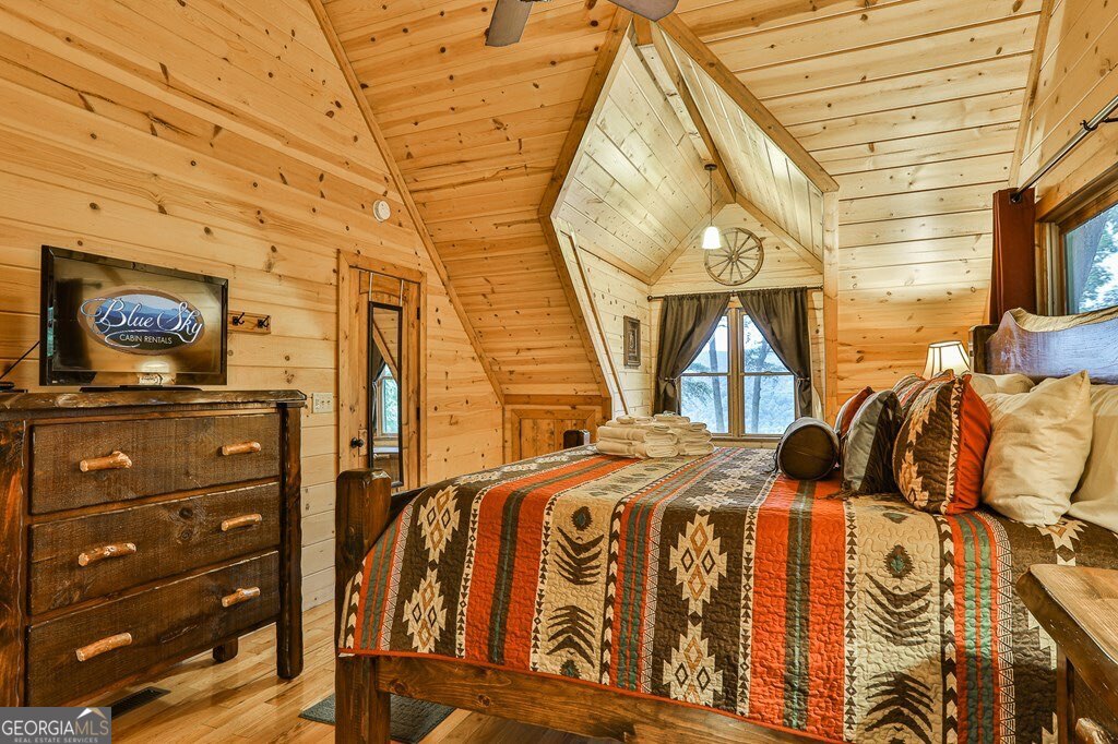 175 Cochise Road, Unit 19 Cherry Log, GA 30522 - Photo 13 of 89 a view of walk in closet with clothes