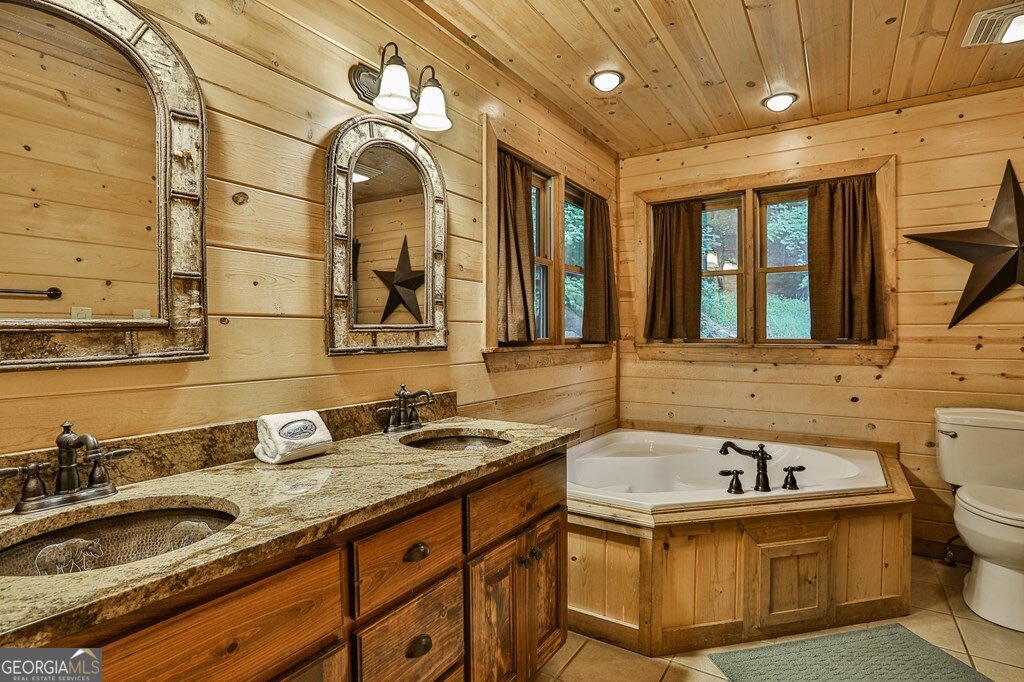 175 Cochise Road, Unit 19 Cherry Log, GA 30522 - Photo 14 of 89 a bathroom with a sink and a mirror