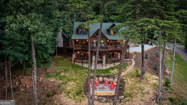a front view of house with outdoor space and seating area