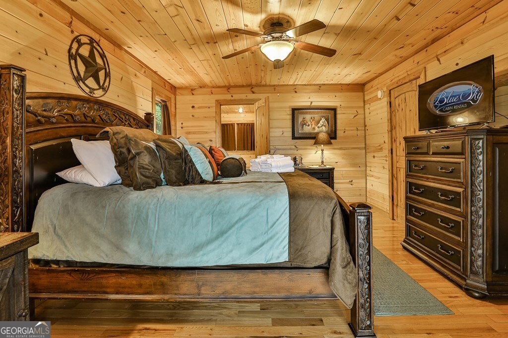 175 Cochise Road, Unit 19 Cherry Log, GA 30522 - Photo 21 of 89 a living room with fireplace furniture and a flat screen tv