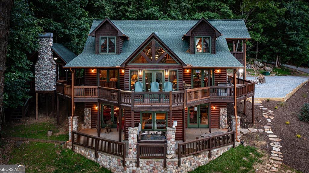 175 Cochise Road, Unit 19 Cherry Log, GA 30522 - Photo 3 of 89 a front view of a house with garden