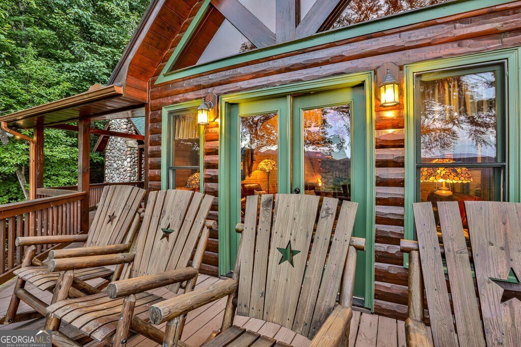 175 Cochise Road, Unit 19 Cherry Log, GA 30522 - Photo 37 of 89 a view of balcony with wooden floor and furniture