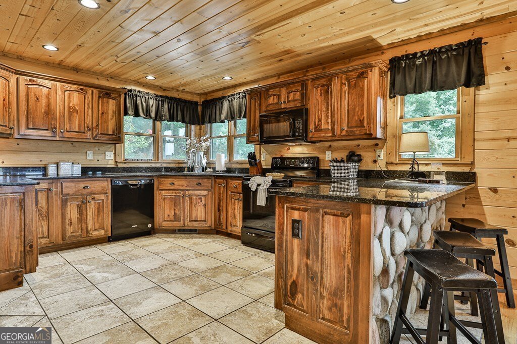 175 Cochise Road, Unit 19 Cherry Log, GA 30522 - Photo 7 of 89 a kitchen with stainless steel appliances granite countertop a stove a sink dishwasher and a refrigerator