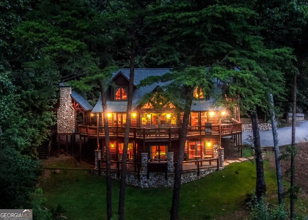 175 Cochise Road, Unit 19 Cherry Log, GA 30522 - Photo 89 of 89 a view of a yard with large tree and a table