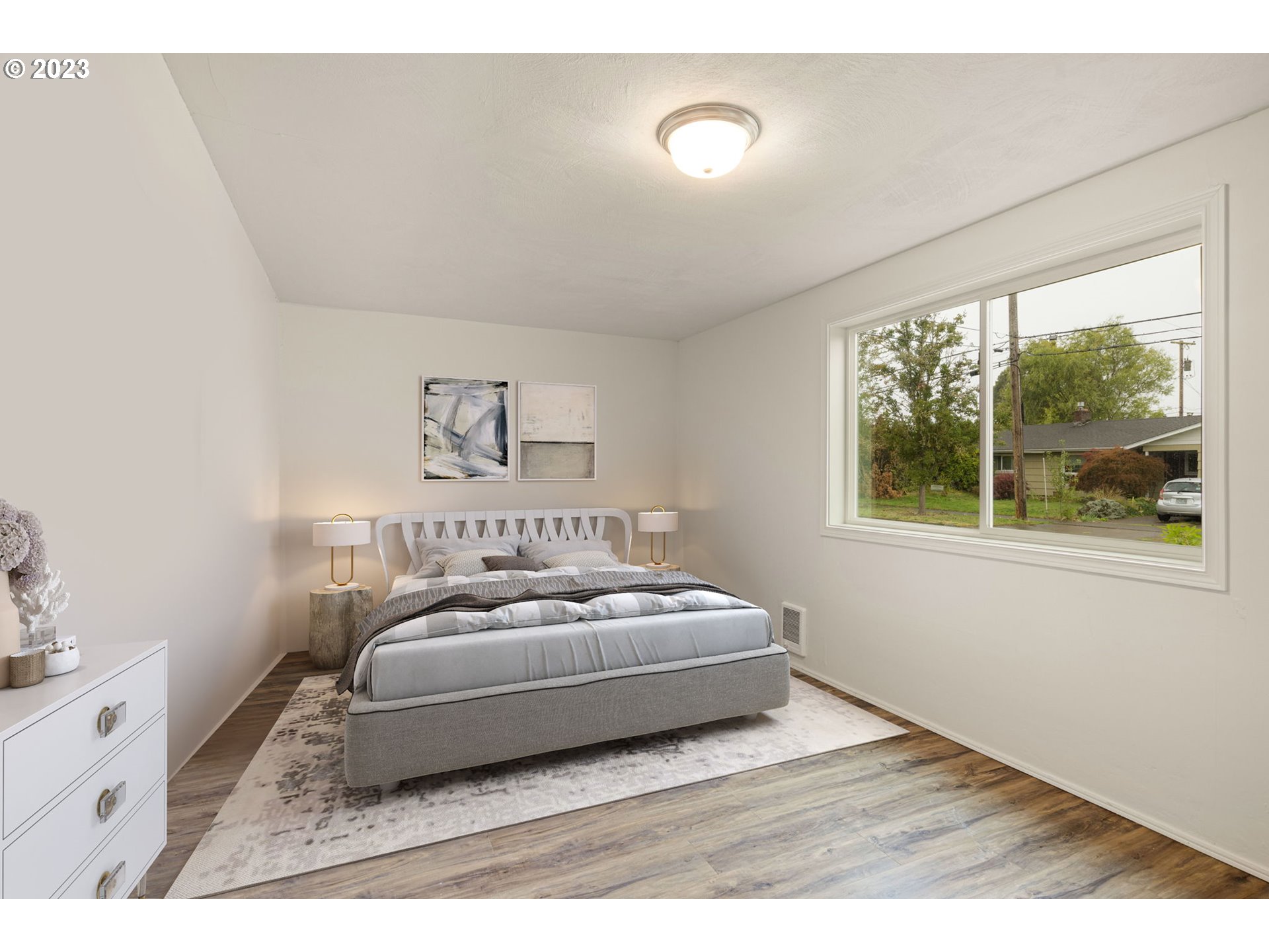1833 North 12th Street Springfield, OR 97477 - Photo 11 of 37 a bedroom with a bed and window