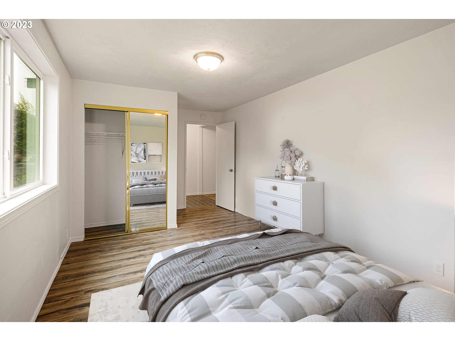 1833 North 12th Street Springfield, OR 97477 - Photo 12 of 37 a bedroom with a bed and window