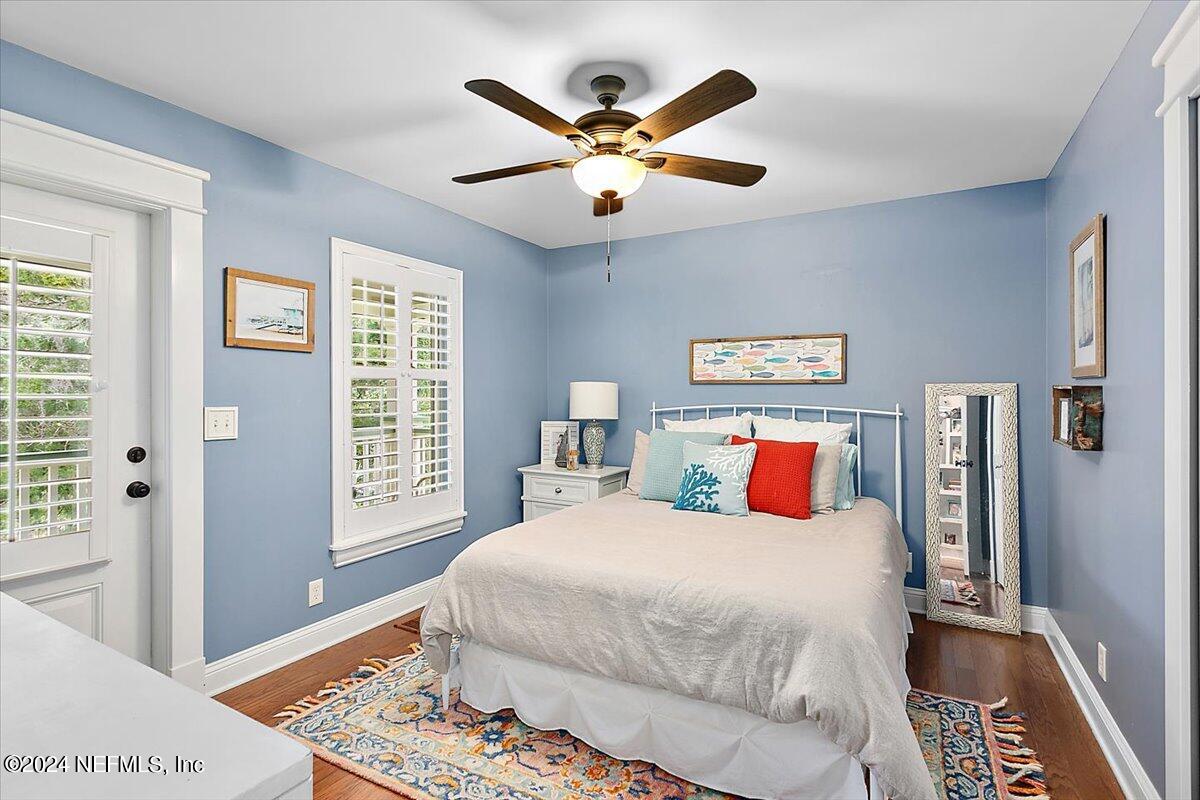 21E Casanova Road St. Augustine, FL 32080 - Photo 17 of 29 a bedroom with a large bed and a window