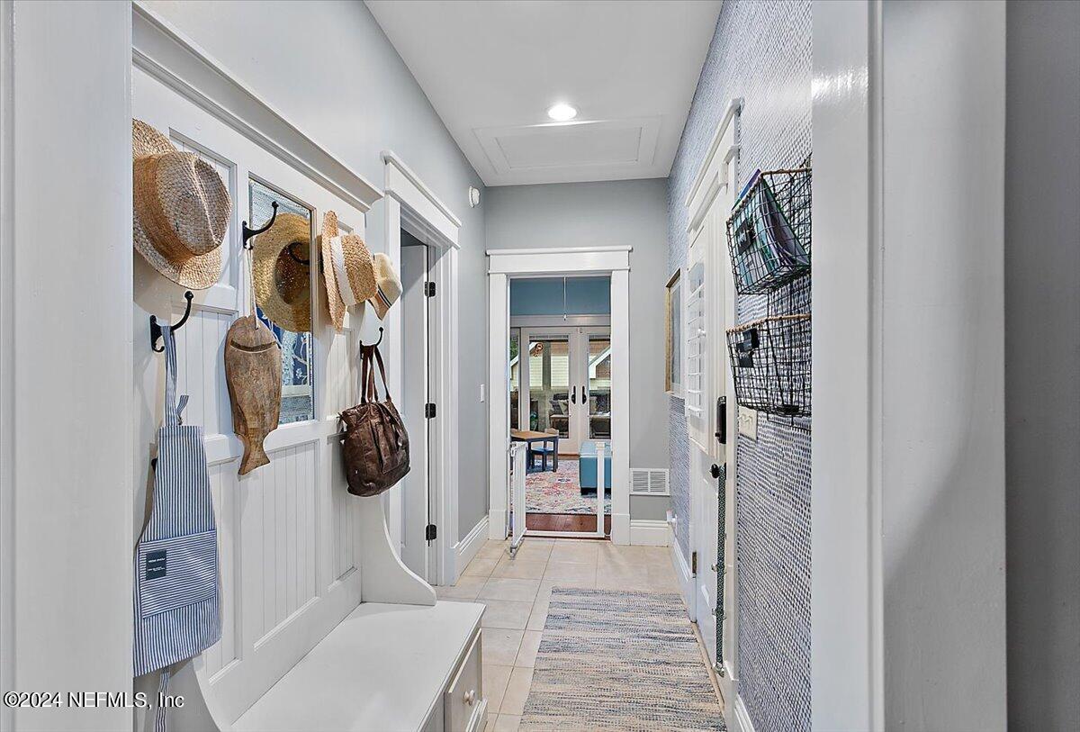 21E Casanova Road St. Augustine, FL 32080 - Photo 18 of 29 a view of a hallway and a livingroom with furniture