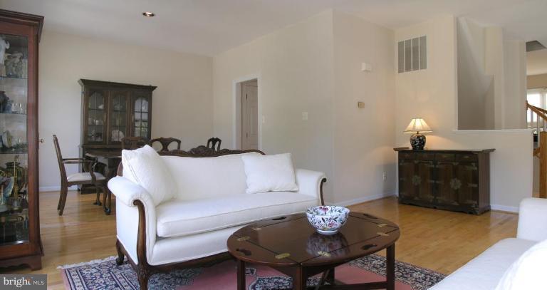 11479 Waterhaven Court Reston, VA 20190 - Photo 4 of 30 Living Room to Builder's Dining Room