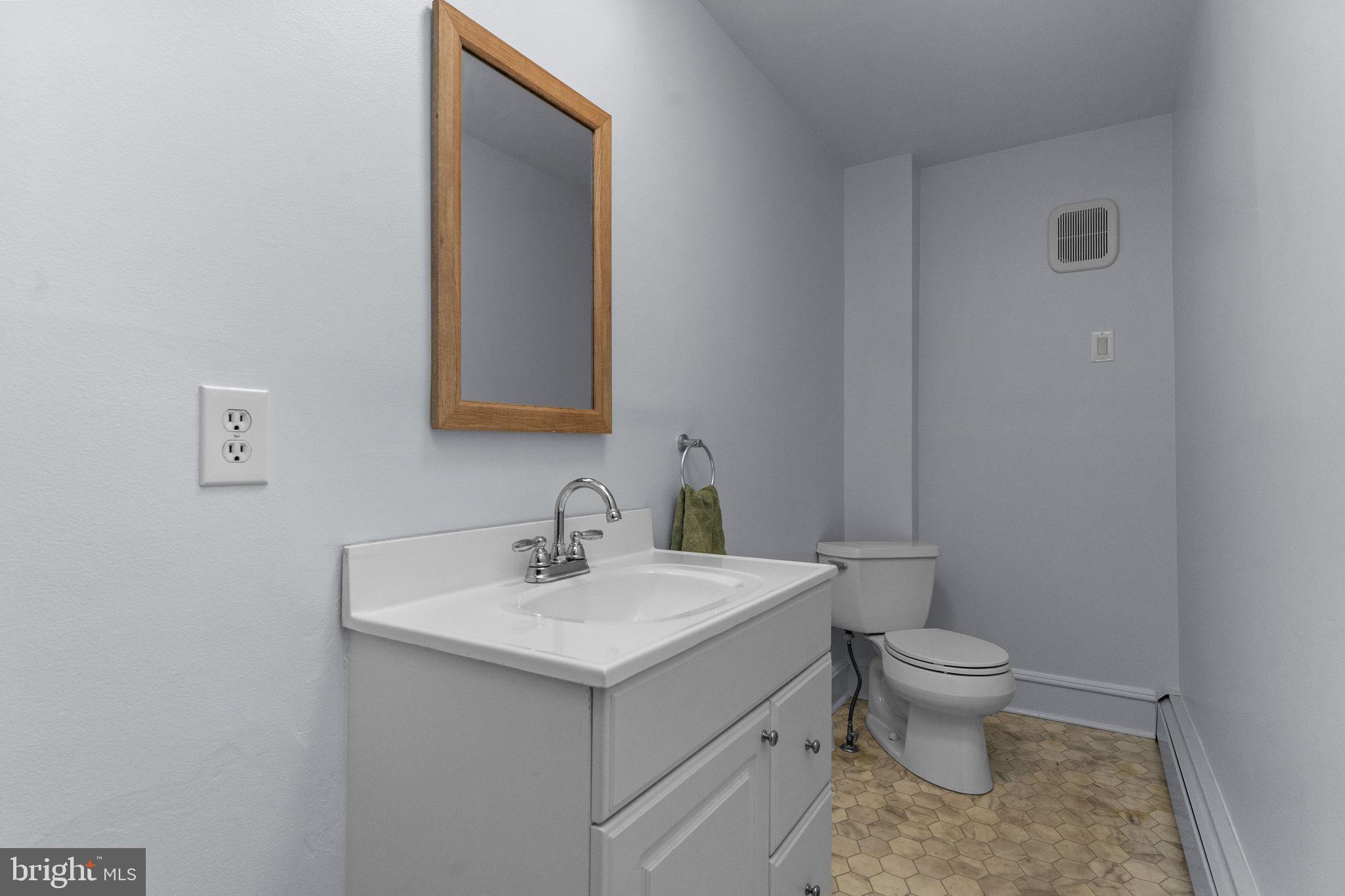 333 Union Street Hatfield, PA 19440 - Photo 14 of 35 a bathroom with a sink toilet and mirror