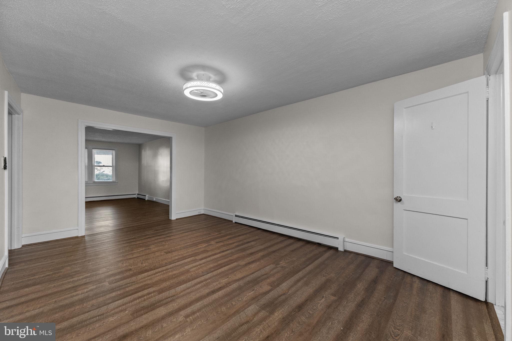 333 Union Street Hatfield, PA 19440 - Photo 9 of 35 a view of empty room with window and wooden floor