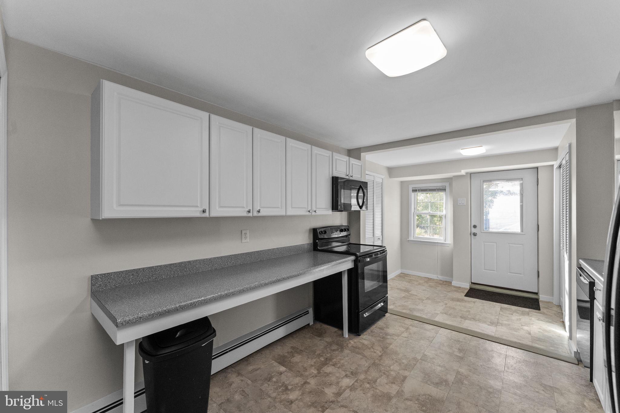 333 Union Street Hatfield, PA 19440 - Photo 10 of 35 a view of a kitchen with cabinets