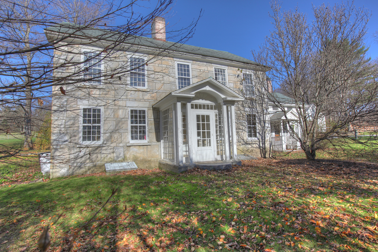 171 Main Road Monterey, MA 01230 - Photo 1 of 42 a front view of a house with a garden