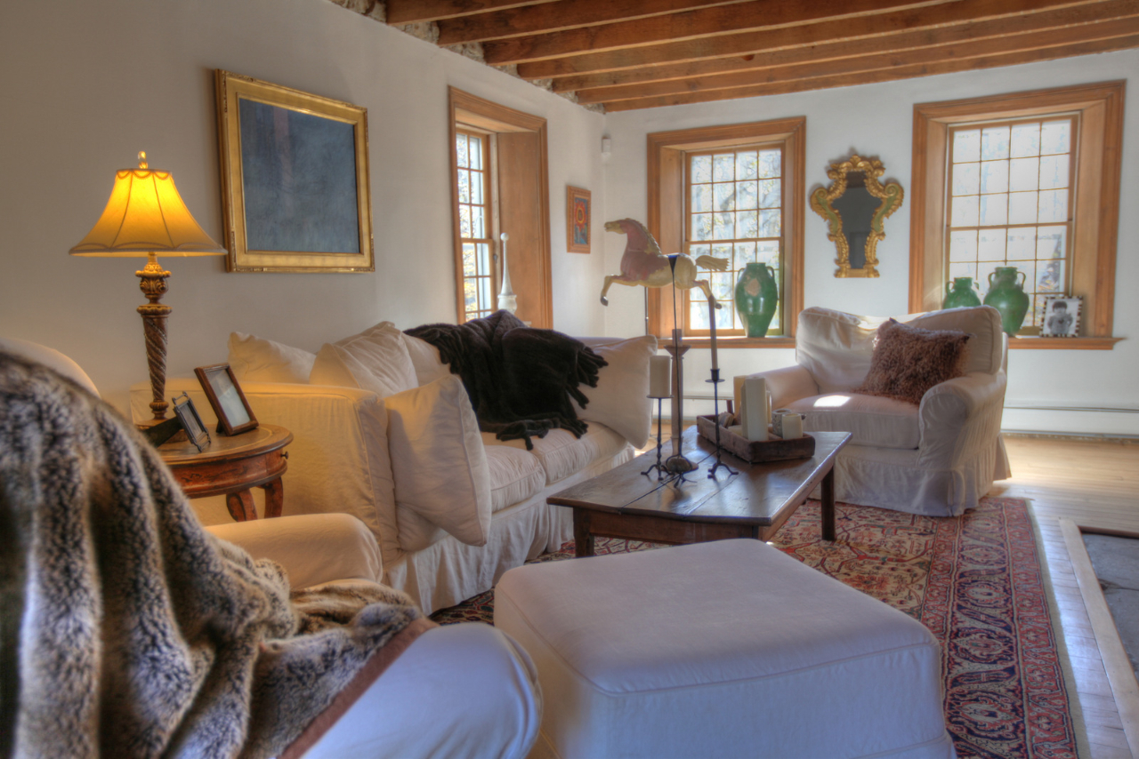 171 Main Road Monterey, MA 01230 - Photo 16 of 42 a living room with furniture and a lamp