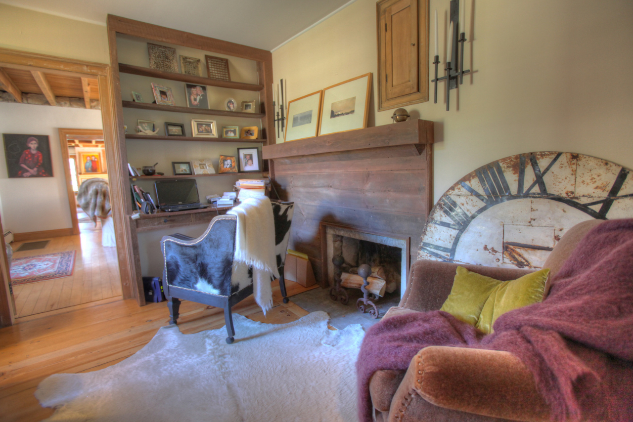 171 Main Road Monterey, MA 01230 - Photo 22 of 42 a living room with furniture and a fireplace