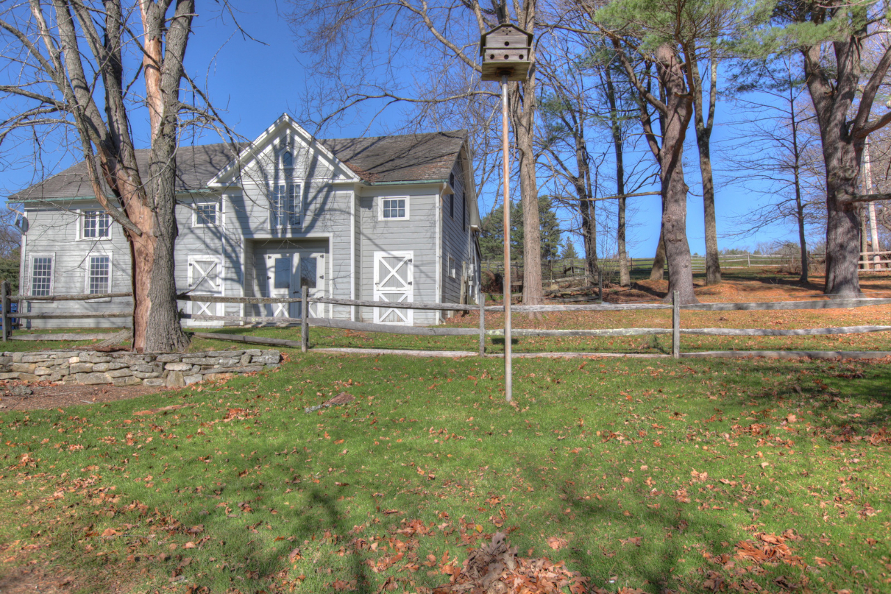 171 Main Road Monterey, MA 01230 - Photo 4 of 42 a view of a house with a yard