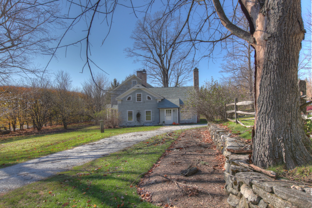 171 Main Road Monterey, MA 01230 - Photo 40 of 42 a front view of a house with a yard and large trees