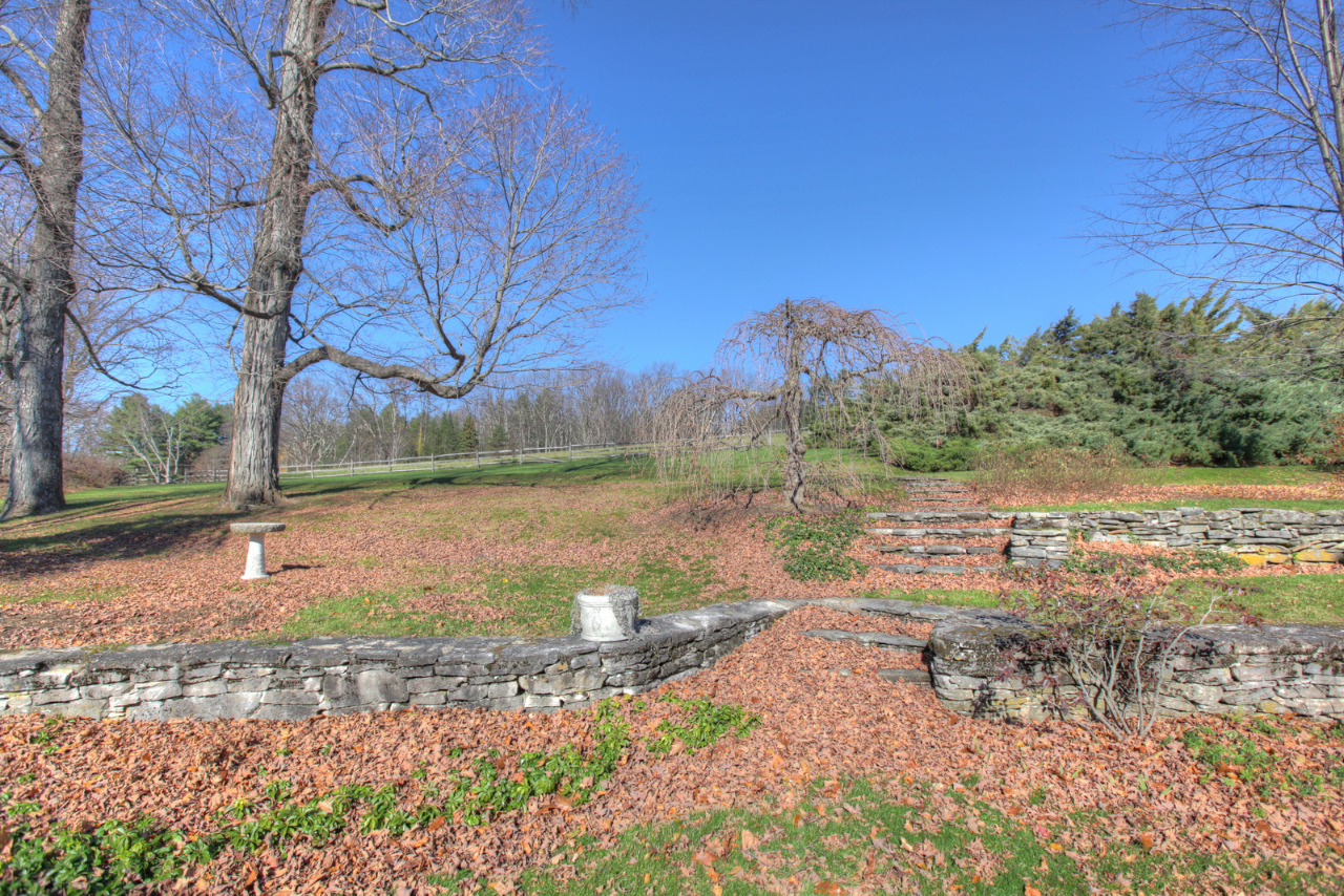 171 Main Road Monterey, MA 01230 - Photo 6 of 42 a view of a yard with a fountain