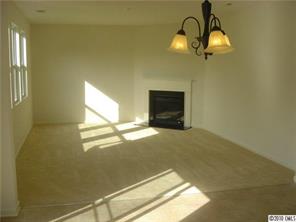 2918 Liddington Road Matthews, NC 28105 - Photo 3 of 6 a view of empty room with a fireplace