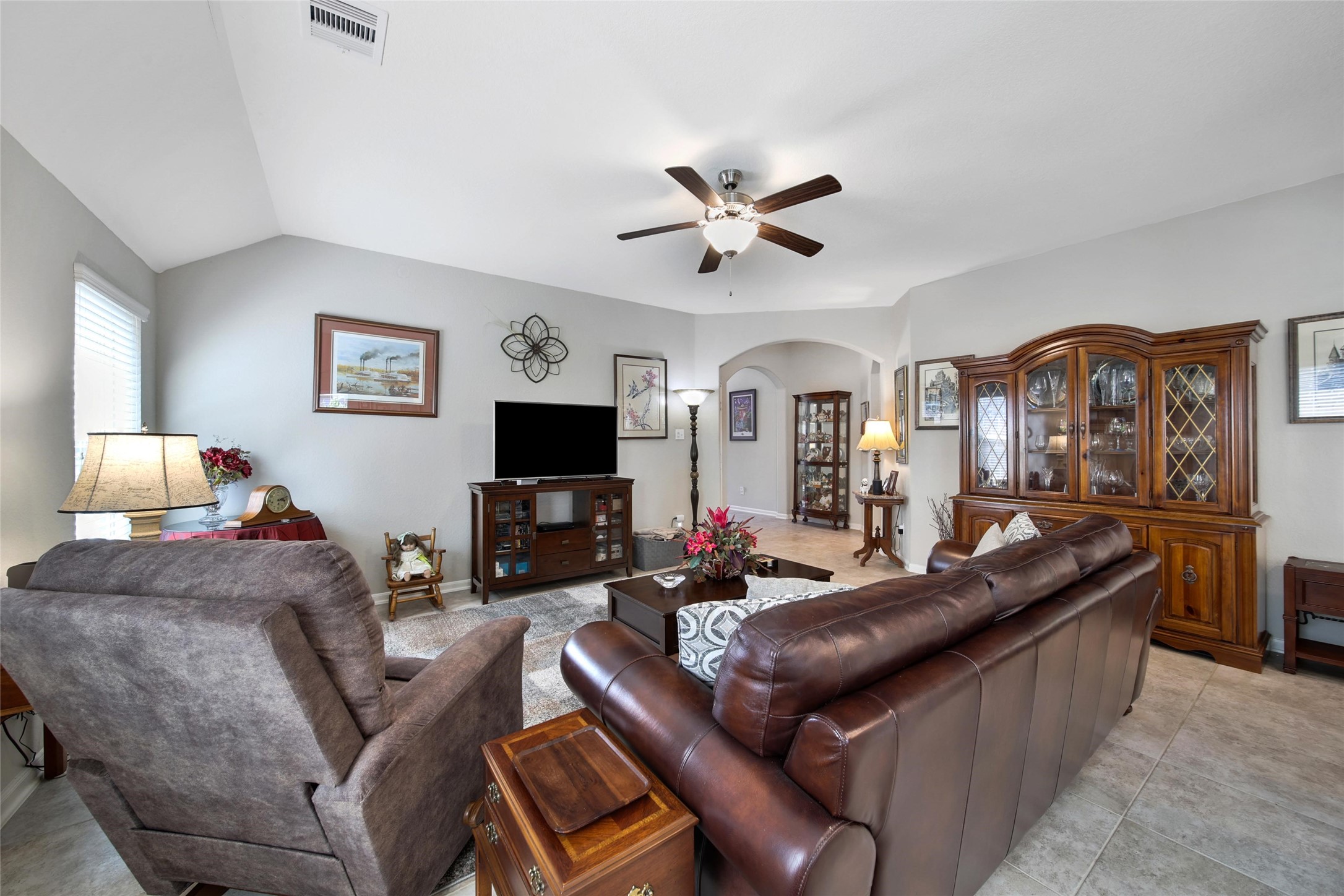 214 Pleasant Hill Way Conroe, TX 77304 - Photo 11 of 43 This large space offers plenty of room for your guests to fiind their own favorite spot.