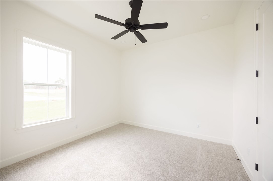 6697 Ridgeview Estates Lane Bryan, TX 77808 - Photo 28 of 31 an empty room with a window