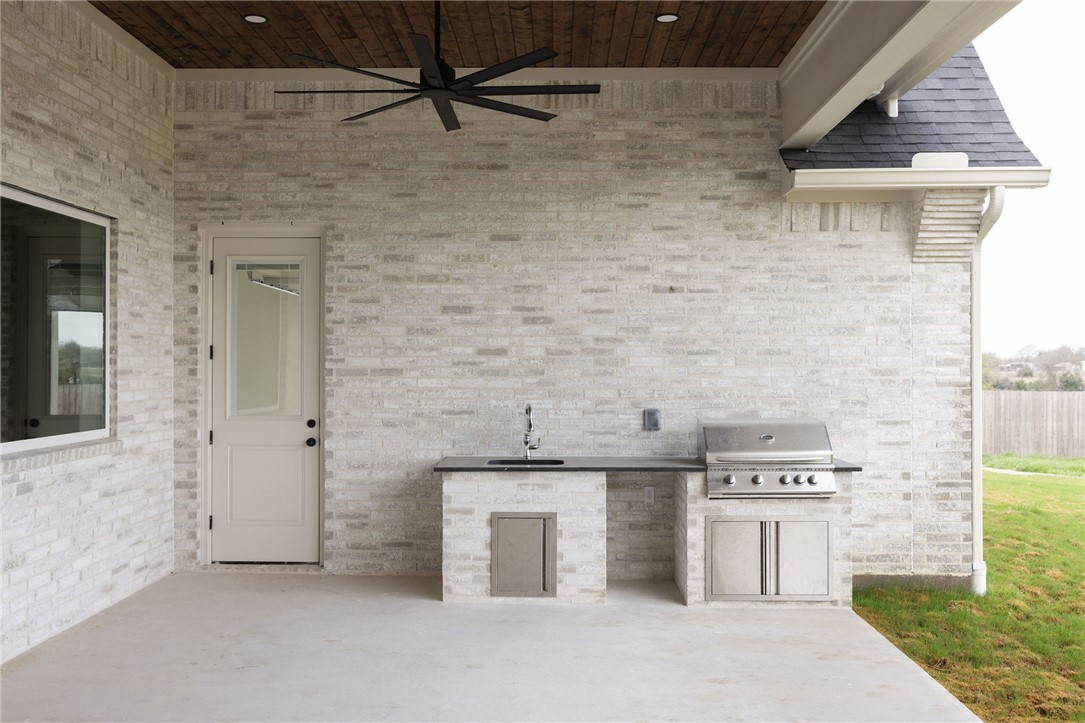 6697 Ridgeview Estates Lane Bryan, TX 77808 - Photo 29 of 31 a bathroom with a sink and a mirror
