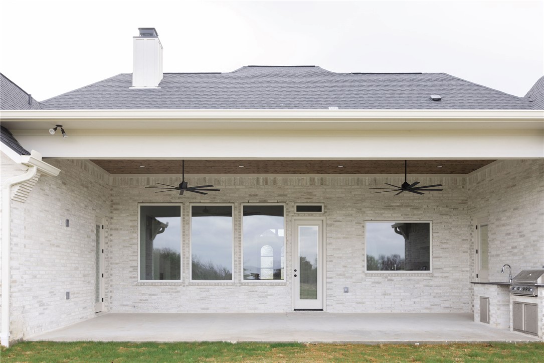 6697 Ridgeview Estates Lane Bryan, TX 77808 - Photo 30 of 31 a front view of a house with a yard
