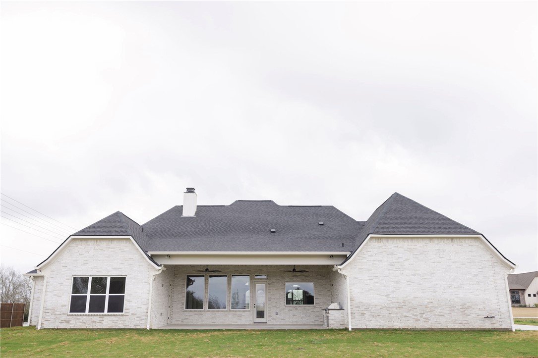 6697 Ridgeview Estates Lane Bryan, TX 77808 - Photo 31 of 31 a view of house with a yard
