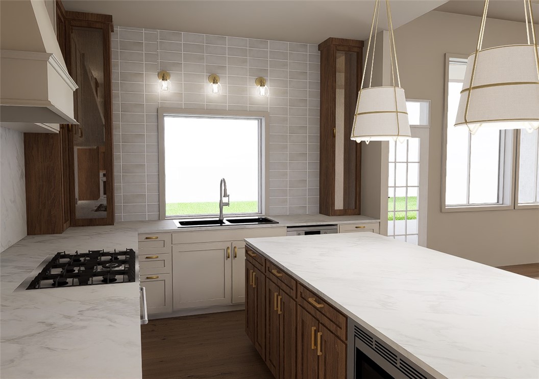 6697 Ridgeview Estates Lane Bryan, TX 77808 - Photo 4 of 12 a kitchen with stainless steel appliances a sink a stove and a refrigerator