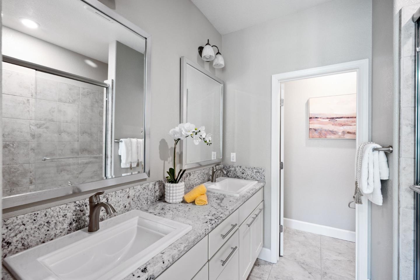 5977 Larkstone Loop San Jose, CA 95123 - Photo 31 of 63 a bathroom with a tub sink and mirror