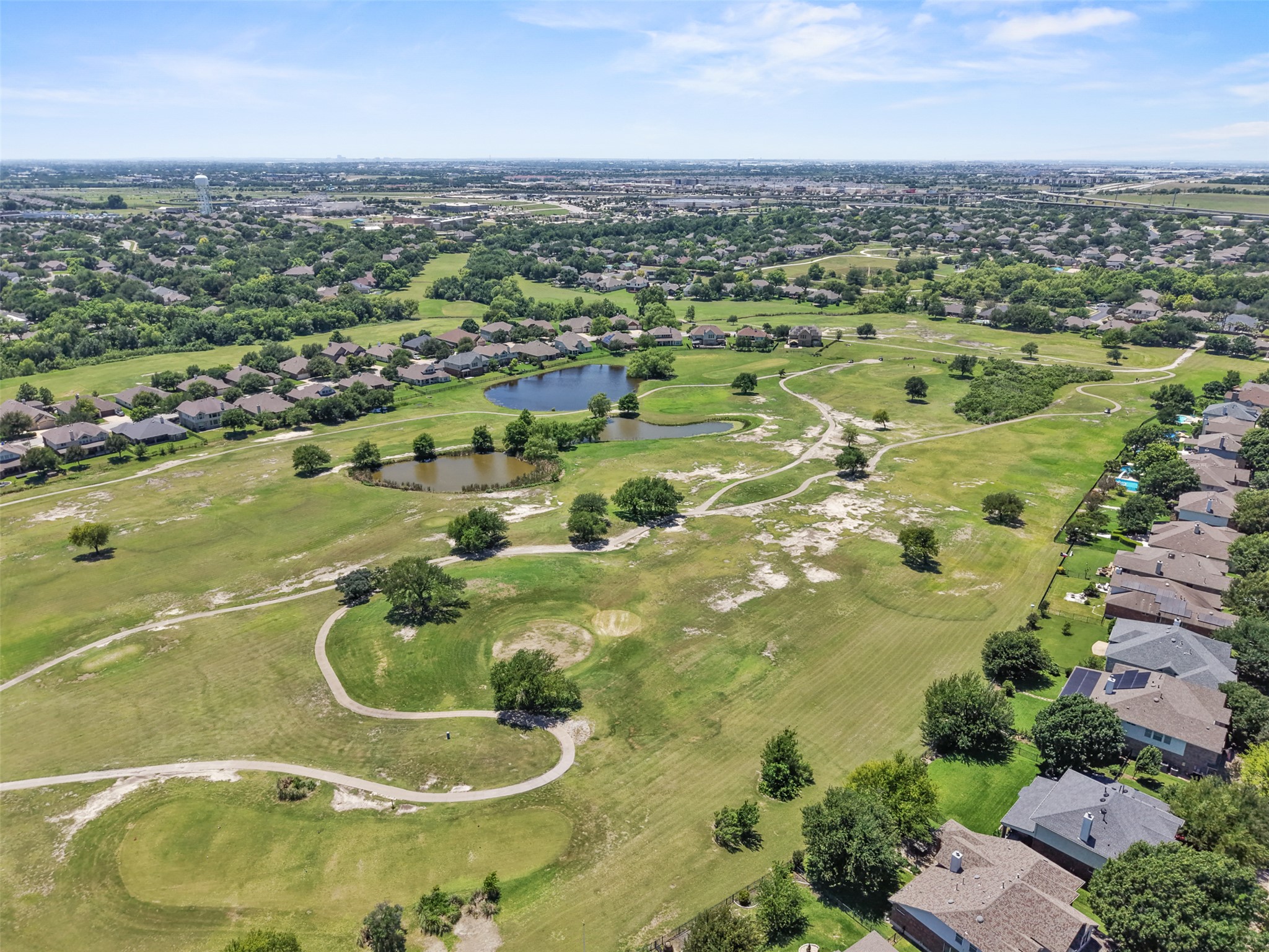 2521 Amen Corner Road Pflugerville, TX 78660 - Photo 2 of 40 Expansive golf course property with multiple water features and mature trees