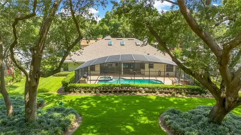 $825,000 | 7750 Apple Tree Circle, Orlando, FL 32819
