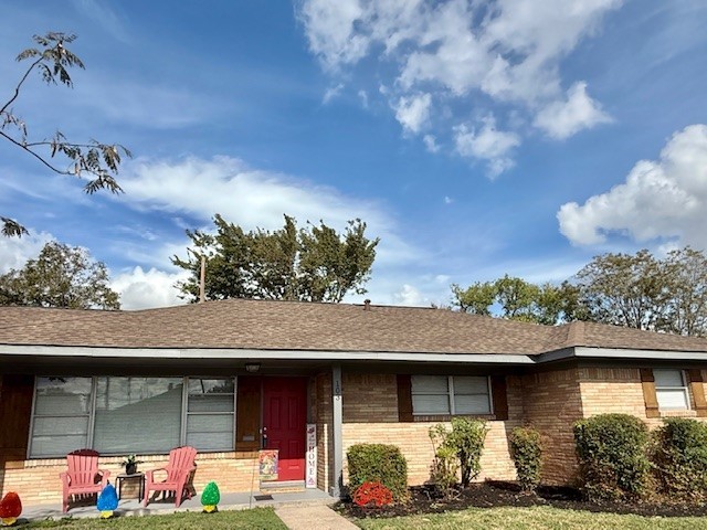 103 East Janisch Road Houston, TX 77022 - Photo 18 of 18 a front view of a house with a garden