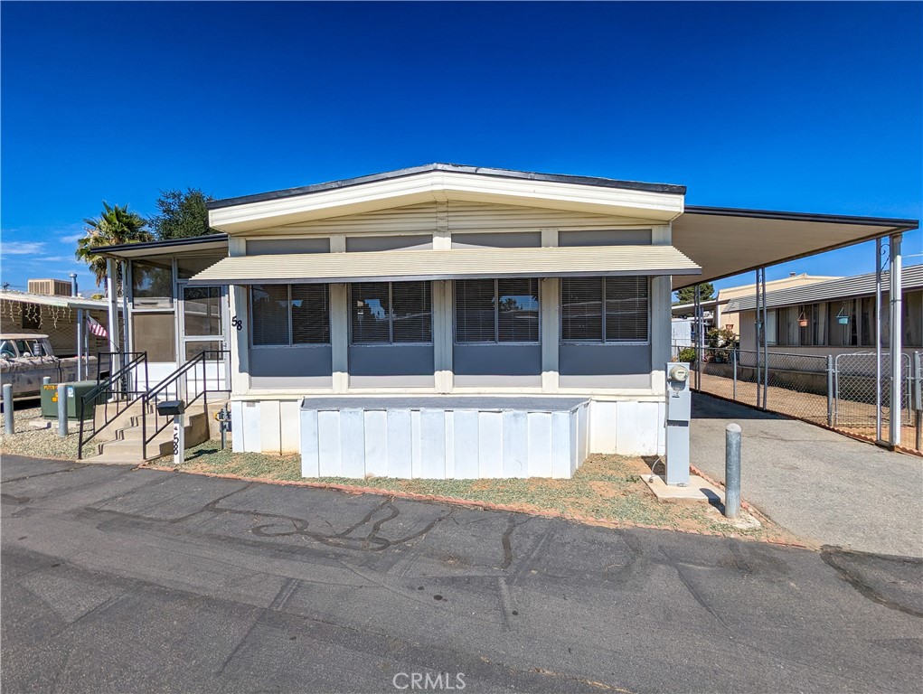 34480 County Line Road, Unit 58 Yucaipa, CA 92399 - Photo 1 of 1 a view of a large building