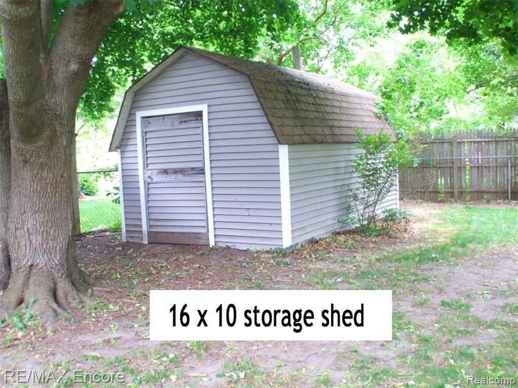 6085 Sunnydale Road Clarkston, MI 48346 - Photo 14 of 15 Storage shed has room for riding lawnmower!
